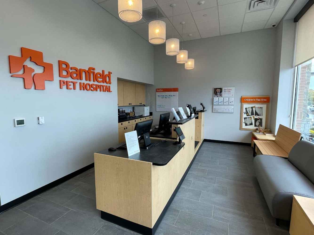 The lobby and desk of Lake Grove Commons
